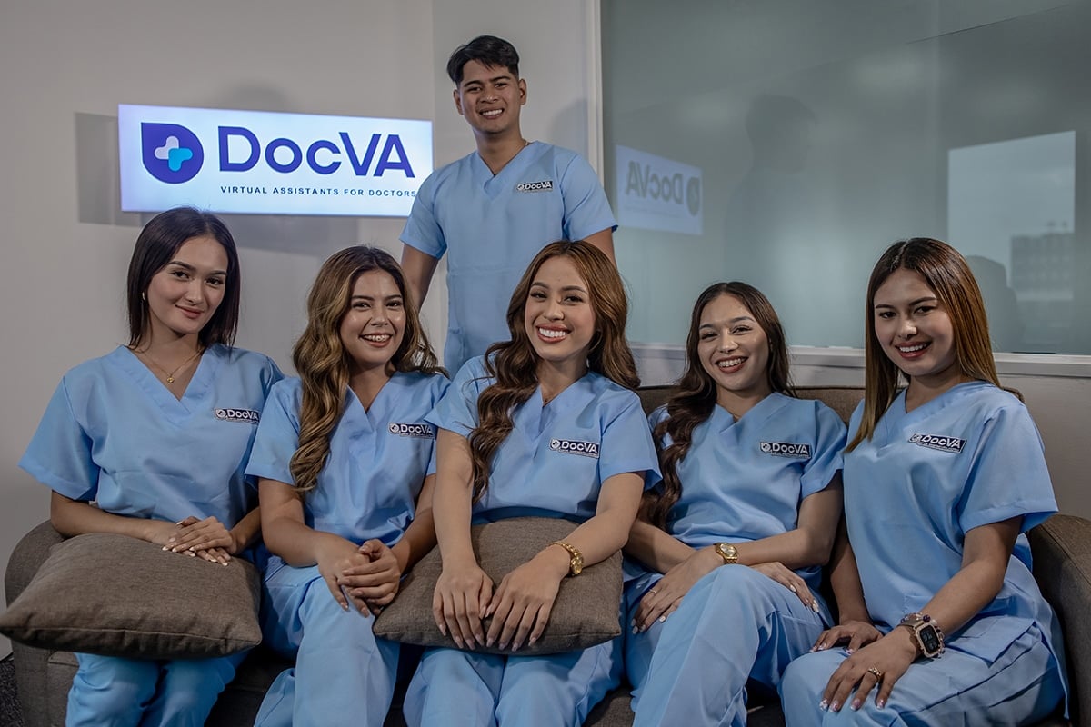DocVA virtual medical assistants in branded scrubs at the DocVA office